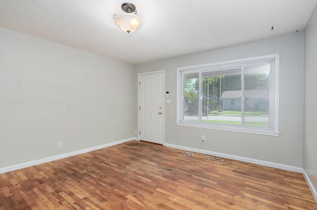 921 S Nettleton Ave, Springfield, MO 65806 - unfurnished room with wood finished floors and baseboards