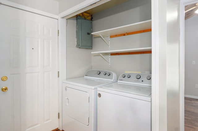 921 S Nettleton Ave, Springfield, MO 65806 - laundry room featuring electric panel, washing machine and clothes dryer, and wood finished floors