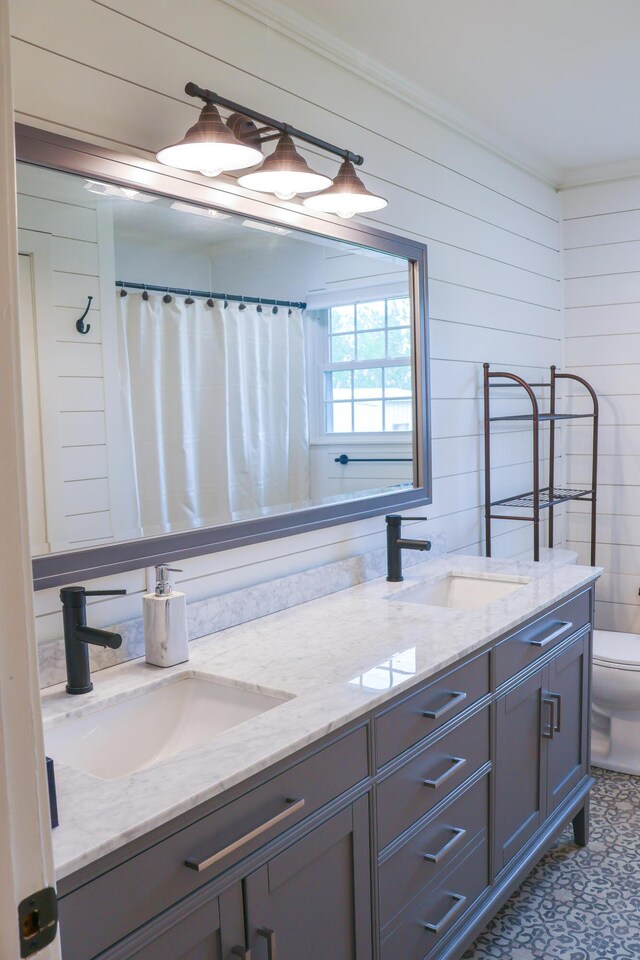 325 N Delaware Ave, Nixa, MO 65714 - bathroom with double vanity and crown molding