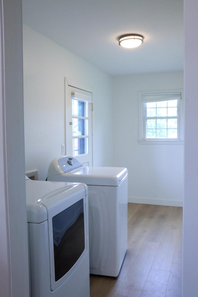 325 N Delaware Ave, Nixa, MO 65714 - laundry room featuring washer and dryer and light wood-style floors