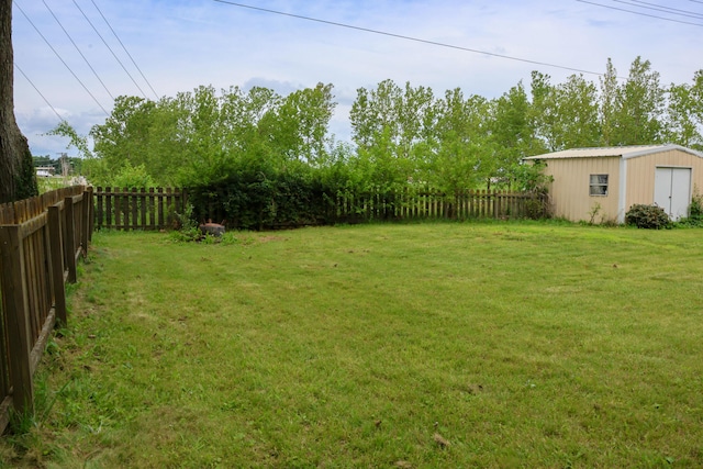 325 N Delaware Ave, Nixa, MO 65714 - fenced backyard featuring a storage unit