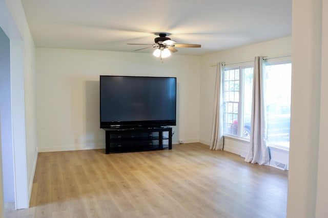 325 N Delaware Ave, Nixa, MO 65714 - living area with ceiling fan and wood finished floors