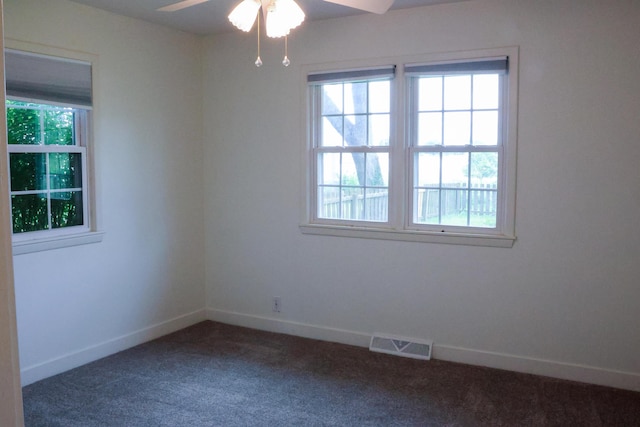 325 N Delaware Ave, Nixa, MO 65714 - spare room with dark colored carpet and a ceiling fan