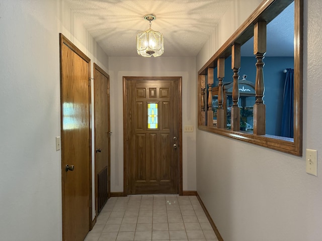 1301 W Blair Dr, Stockton, MO 65785 - doorway to outside featuring a chandelier and light tile patterned floors