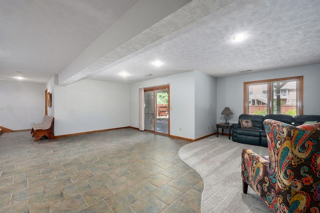 5150 S Dollison Ave, Springfield, MO 65810 - living area with stone finish flooring, recessed lighting, and a textured ceiling