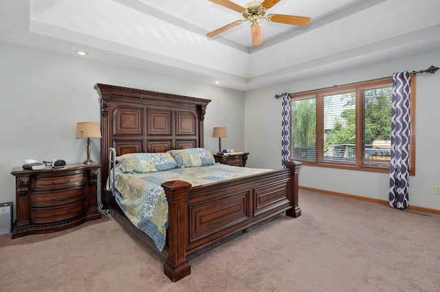 5150 S Dollison Ave, Springfield, MO 65810 - bedroom with light colored carpet, recessed lighting, a raised ceiling, and a ceiling fan