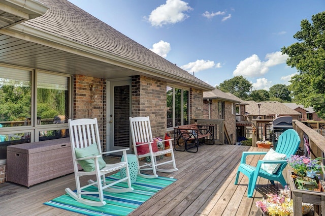 5150 S Dollison Ave, Springfield, MO 65810 - wooden deck with a grill