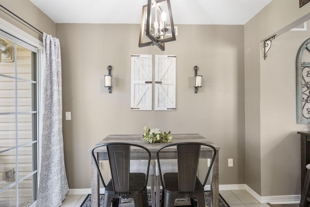 151 Vixen Cir Unit L, Branson, MO 65616 - dining area featuring light tile patterned flooring and baseboards