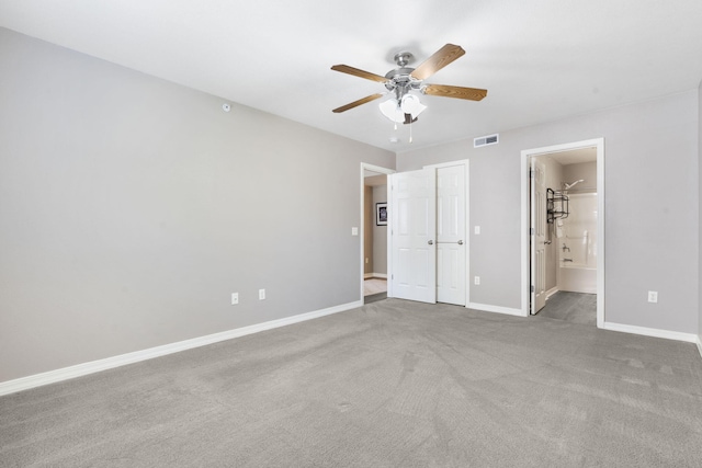 151 Vixen Cir Unit L, Branson, MO 65616 - unfurnished bedroom featuring carpet floors, connected bathroom, and ceiling fan