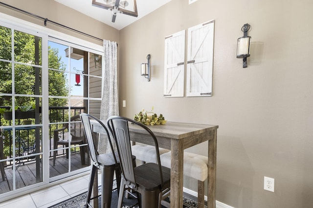 151 Vixen Cir Unit L, Branson, MO 65616 - dining room featuring light tile patterned floors and a ceiling fan