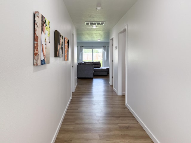 404 N Pine Leaf Rd, Nixa, MO 65714 - corridor with baseboards and wood finished floors