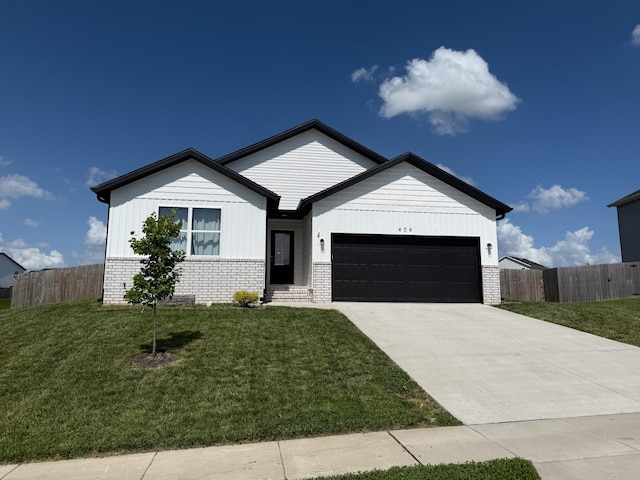 404 N Pine Leaf Rd, Nixa, MO 65714 - ranch-style house with an attached garage, brick siding, and driveway