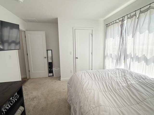 404 N Pine Leaf Rd, Nixa, MO 65714 - carpeted bedroom with multiple windows