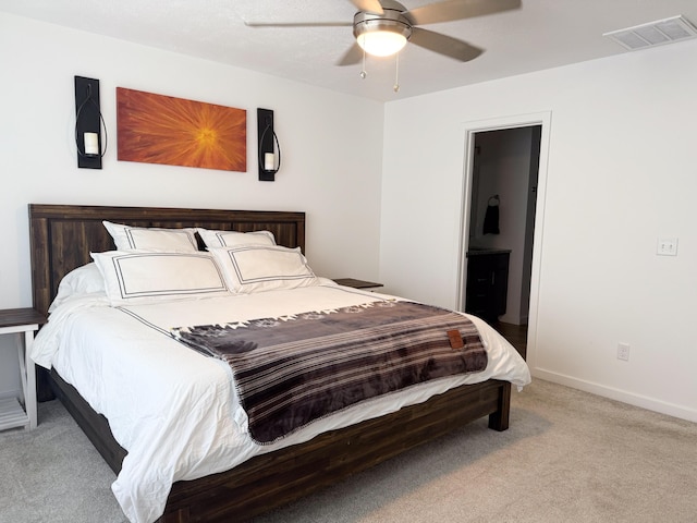 404 N Pine Leaf Rd, Nixa, MO 65714 - carpeted bedroom with ensuite bath and a ceiling fan