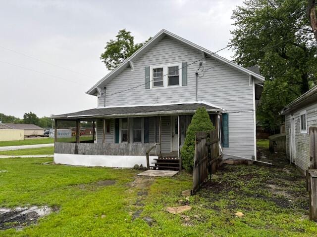 148 E Front St, Fordland, MO 65652 - view of front facade with a porch and a front lawn