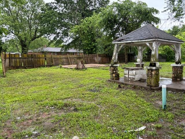 148 E Front St, Fordland, MO 65652 - fenced backyard with a gazebo