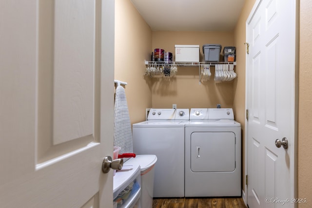 1704 Luna Dr, West Plains, MO 65775 - laundry area with independent washer and dryer and dark wood-style flooring