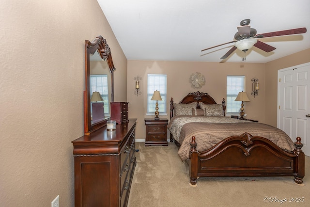 1704 Luna Dr, West Plains, MO 65775 - bedroom with multiple windows, light carpet, and ceiling fan