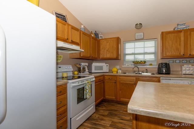 1704 Luna Dr, West Plains, MO 65775 - kitchen featuring white appliances, under cabinet range hood, dark wood-style flooring, and light countertops
