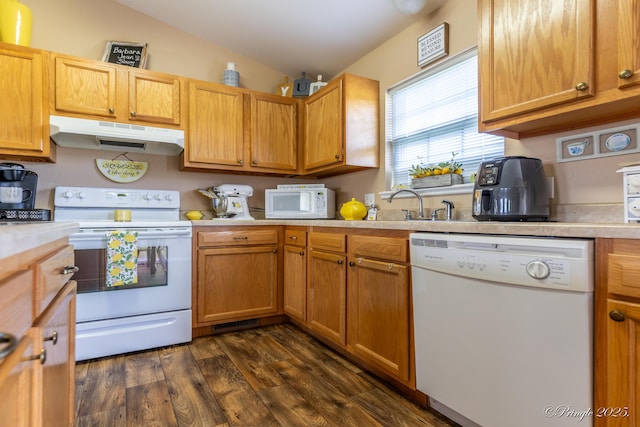 1704 Luna Dr, West Plains, MO 65775 - kitchen featuring white appliances, under cabinet range hood, light countertops, dark wood-style flooring, and vaulted ceiling