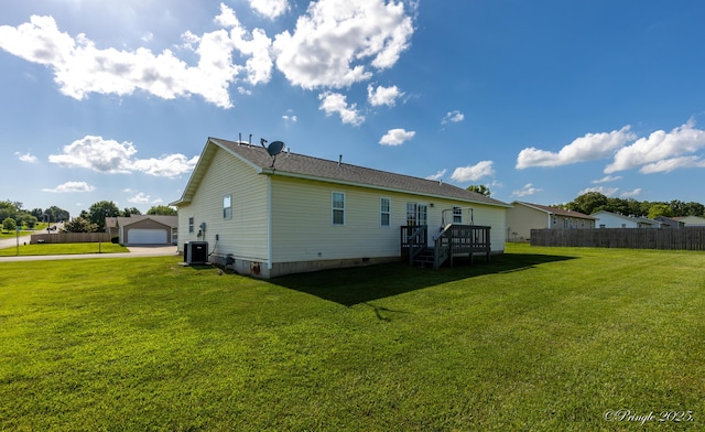 1704 Luna Dr, West Plains, MO 65775 - rear view of property with a wooden deck and a garage