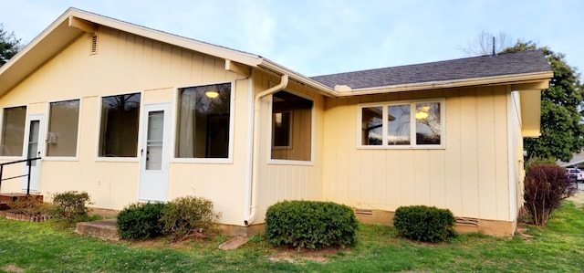 16 Magnolia Ct Unit B, Branson, MO 65616 - view of side of property with a lawn and crawl space