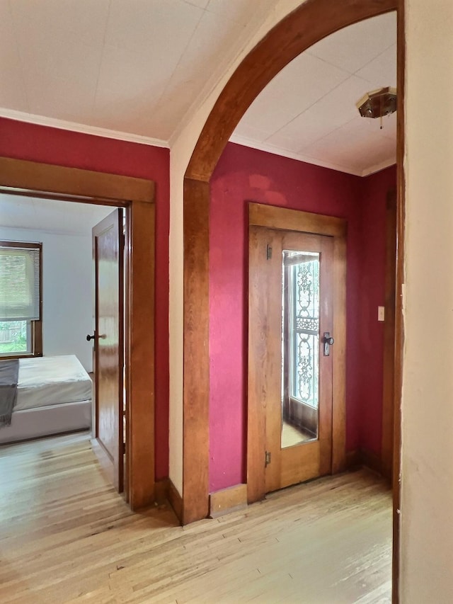 505 Sycamore St, Van Buren, MO 63965 - hall featuring arched walkways, wood finished floors, and crown molding