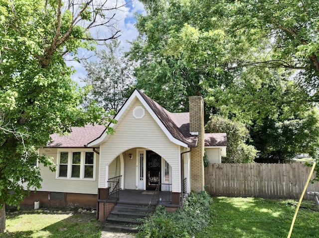 505 Sycamore St, Van Buren, MO 63965 - view of front of property with a porch, a chimney, and a shingled roof