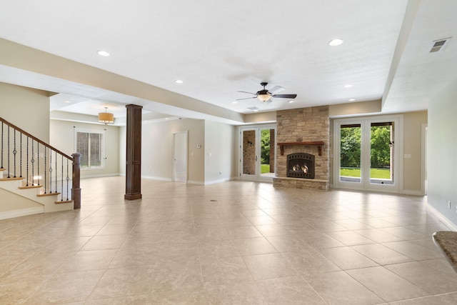755 N Fallbrooke Ter, Springfield, MO 65802 - unfurnished living room with ceiling fan, a fireplace, recessed lighting, light tile patterned floors, and stairway