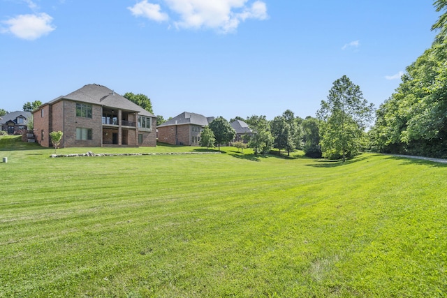 755 N Fallbrooke Ter, Springfield, MO 65802 - view of grassy yard featuring a balcony
