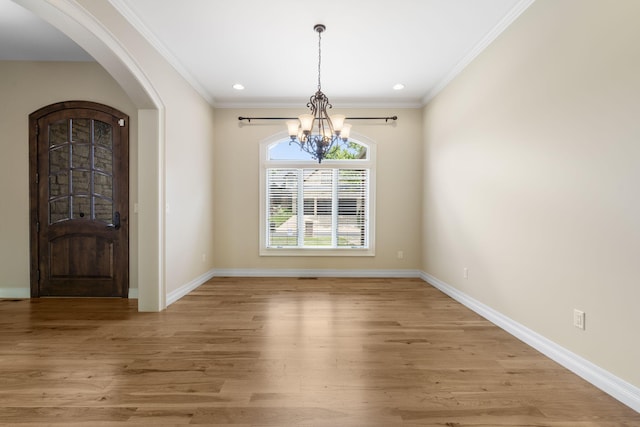755 N Fallbrooke Ter, Springfield, MO 65802 - entryway with a chandelier, arched walkways, light wood-style flooring, crown molding, and recessed lighting