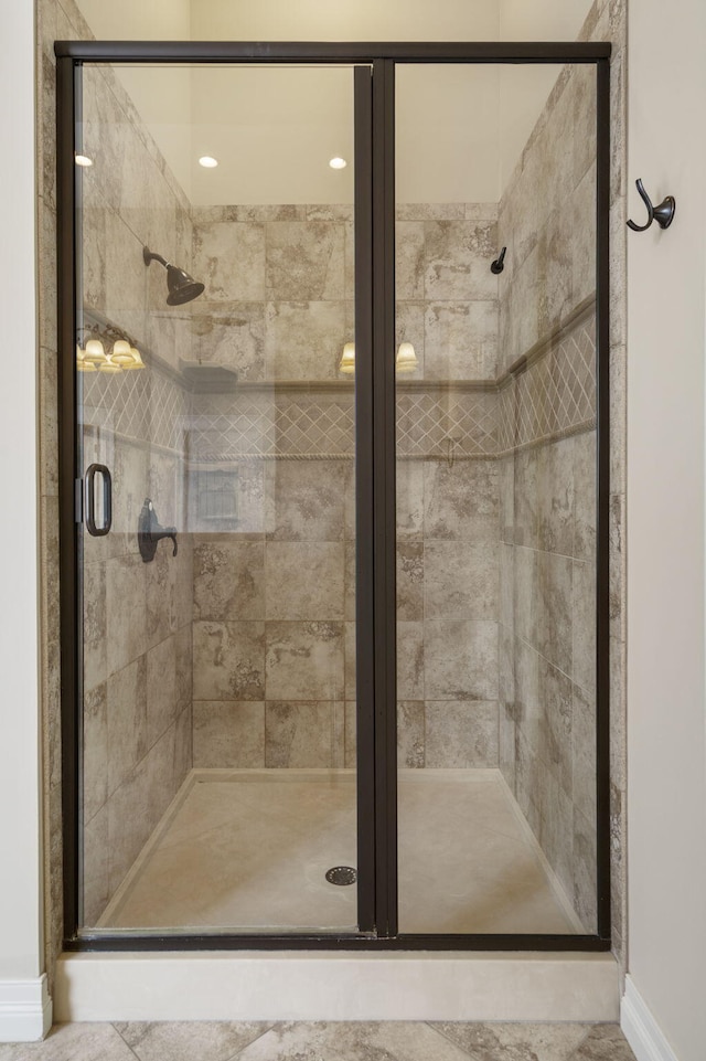 755 N Fallbrooke Ter, Springfield, MO 65802 - full bathroom with a stall shower and baseboards