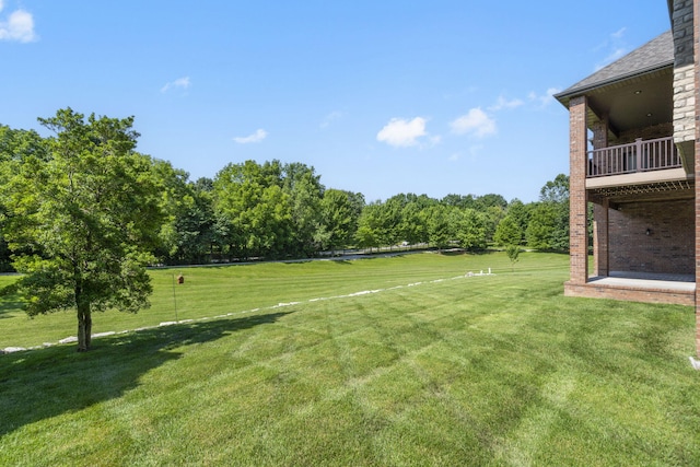 755 N Fallbrooke Ter, Springfield, MO 65802 - view of grassy yard with a balcony