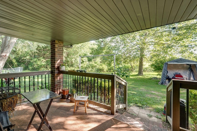 263 Crystal Ave, Sparta, MO 65753 - wooden terrace with a lawn and view of wooded area