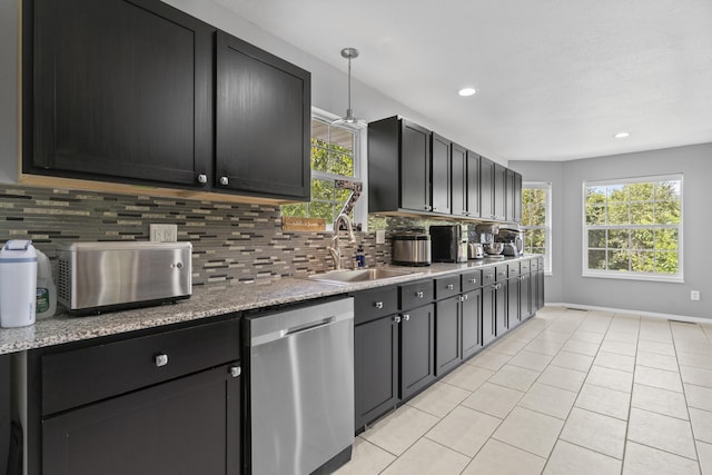 1917 Willoughby Rd, Clever, MO 65631 - kitchen with stainless steel dishwasher, decorative backsplash, healthy amount of natural light, and recessed lighting