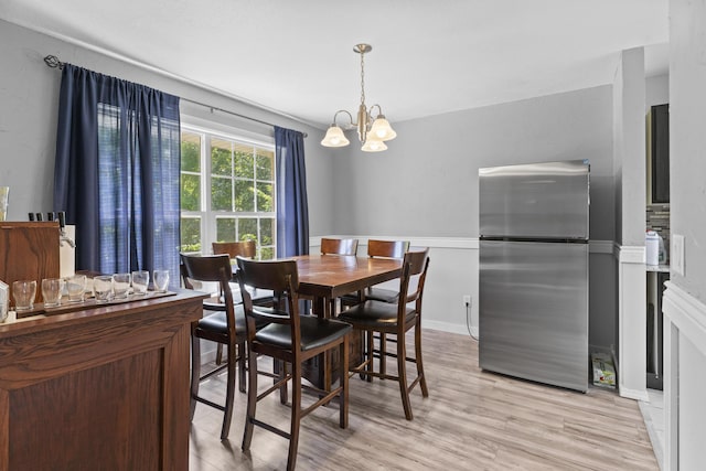 1917 Willoughby Rd, Clever, MO 65631 - dining area featuring a chandelier and light wood-style floors