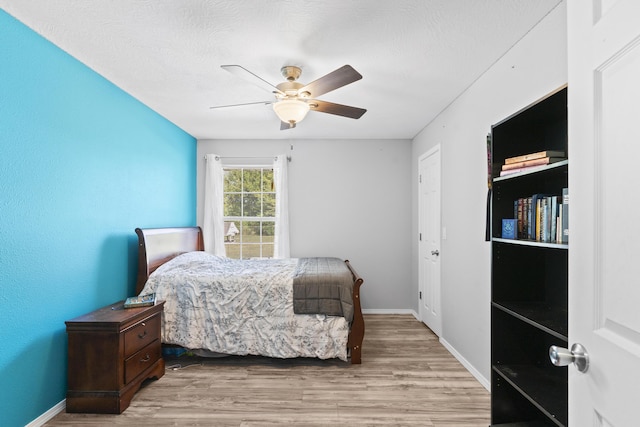 1917 Willoughby Rd, Clever, MO 65631 - bedroom with wood finished floors and a ceiling fan