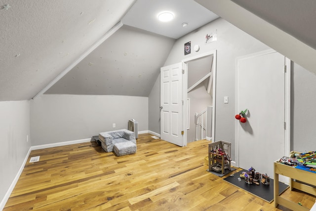 2116 N Main Ave, Springfield, MO 65803 - additional living space featuring wood finished floors and lofted ceiling