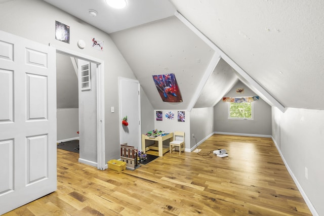 2116 N Main Ave, Springfield, MO 65803 - additional living space featuring light wood finished floors and lofted ceiling