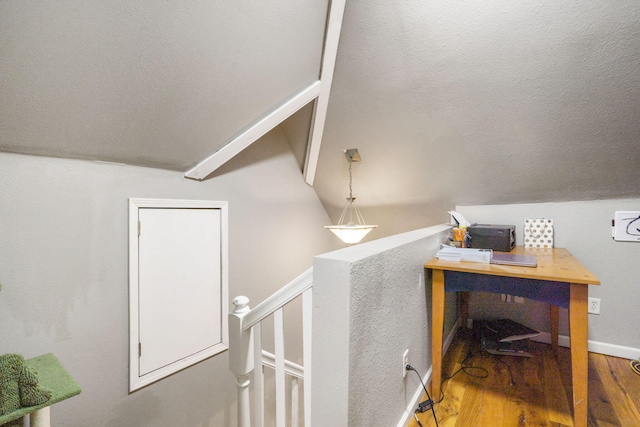2116 N Main Ave, Springfield, MO 65803 - stairway with lofted ceiling, wood finished floors, and a textured ceiling
