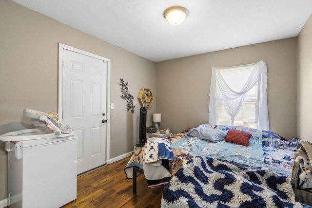 2116 N Main Ave, Springfield, MO 65803 - bedroom with wood finished floors and baseboards