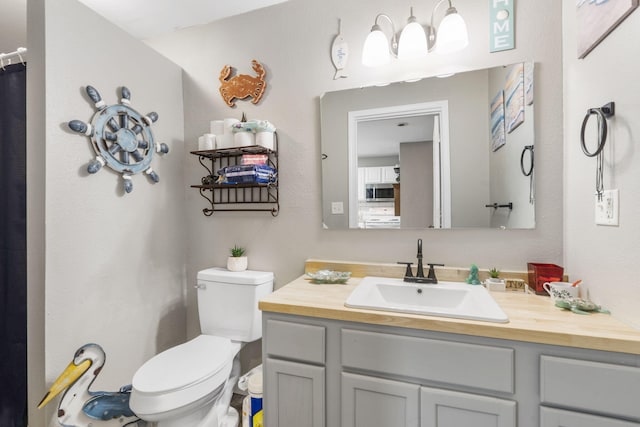 2116 N Main Ave, Springfield, MO 65803 - bathroom with toilet and vanity