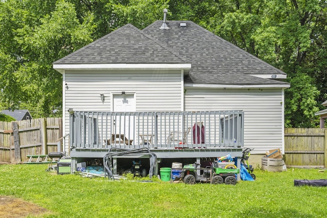 2116 N Main Ave, Springfield, MO 65803 - back of property featuring a shingled roof and a deck