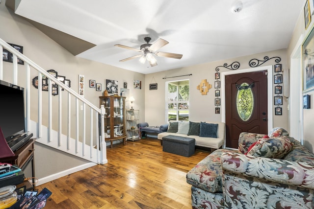 2116 N Main Ave, Springfield, MO 65803 - living area featuring stairs, a ceiling fan, and wood finished floors