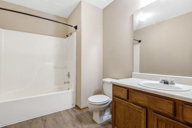 5590 S Aaron Ave, Springfield, MO 65810 - bathroom featuring wood finished floors, vanity, and  shower combination