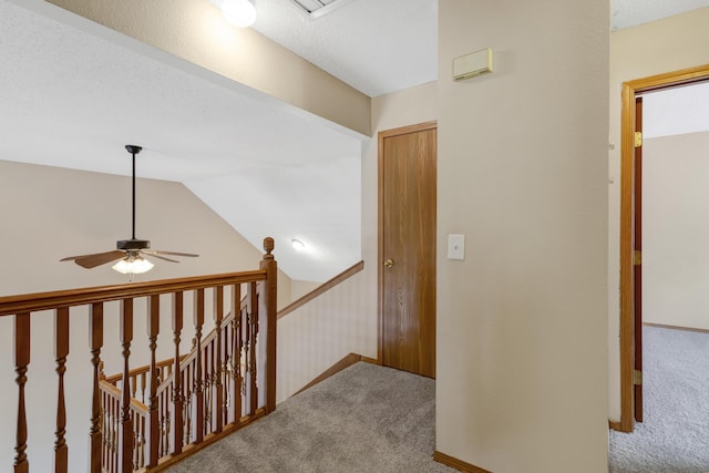 5590 S Aaron Ave, Springfield, MO 65810 - corridor with an upstairs landing, carpet floors, and vaulted ceiling