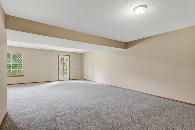 5590 S Aaron Ave, Springfield, MO 65810 - unfurnished room featuring carpet, healthy amount of natural light, and a textured ceiling