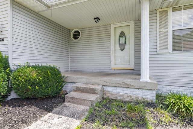 5590 S Aaron Ave, Springfield, MO 65810 - doorway to property with a porch