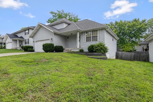 5590 S Aaron Ave, Springfield, MO 65810 - view of front of home featuring an attached garage and roof with shingles