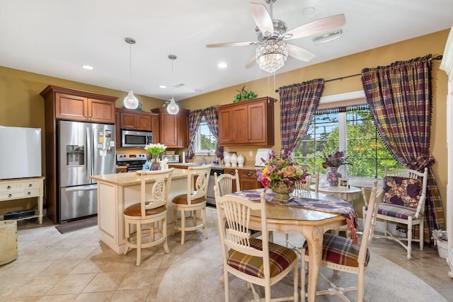 110 Stillwood Dr, Branson, MO 65616 - dining area featuring ceiling fan, light tile patterned floors, and recessed lighting